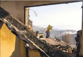  ?? Kent Nishimura Los Angeles Times ?? THE WOOLSEY FIRE destroyed 27 homes in Bell Canyon and damaged 17 more. The home that Mayor Eric Garcetti asked to be checked came out unscathed.