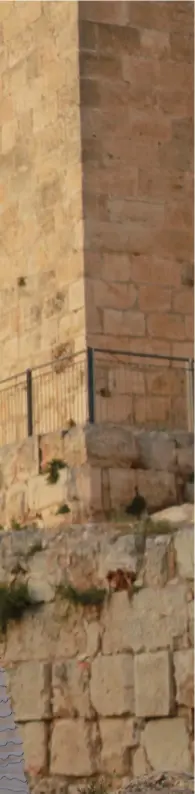  ?? (Nina Broder) ?? JERUSALEM’S OLD City walls play host to a Brager Couture Black &amp; White gown.