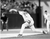  ?? MATT STAMEY/ASSOCIATED PRESS ?? UF closer and Olympia High alum Michael Byrne gave his team 4 innings of scoreless relief and a chance to rally.