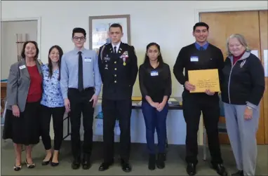  ?? RECORDER PHOTO BY JAMIE HUNT ?? From left: Awards Program Chair Pat Holly, Diana Andrade, Christian Pimentel, Tristin Joel Galvan, Stephanie Canchola, Andy Garcia, and Chapter Regent Deanna Pettus at the annual Daughters of the American Revolution student awards Saturday at the Westwood Village clubhouse in Portervill­e.