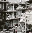  ?? Foto: dpa ?? In der syrischen Hauptstadt Damaskus wurden im Krieg viele Häuser zerstört. In den Ruinen leben auch Kinder.
