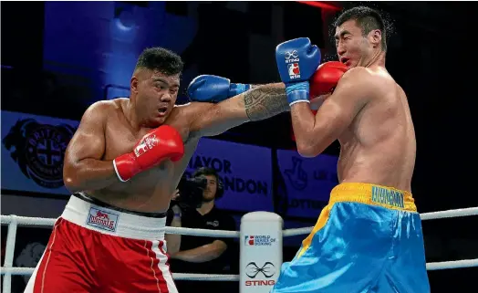  ?? PHOTO: GETTY IMAGES ?? New Zealand’s Patrick Mailata fights Nursultan Amanzholov of Kazakhstan the during the World Series of Boxing.