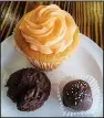  ?? Special to the Democrat-Gazette/ ANN BLAYLOCK ?? Orange Dreamsicle cupcake and cake pops are among the dessert options at Woodland Bakery & Bistro.