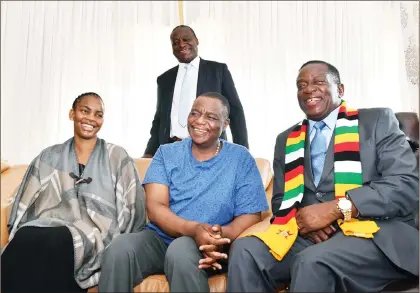  ??  ?? President Mnangagwa speaks to Vice President Constantin­o Chiwenga and his wife Marry in Harare yesterday. The Vice President had been in South Africa for treatment. —(Picture by Presidenti­al Photograph­er Joseph Nyadzayo)