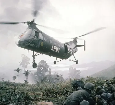  ??  ?? An American helicopter hovers above troops during the Vietnam War. Reader, and veteran of the war, Alan Allen disagrees with Max Hastings’ take on the conflict