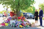  ?? ANDREW HARNIK/ASSOCIATED PRESS ?? President Joe Biden and first lady Jill Biden visit the scene of Saturday’s shooting in Buffalo, N.Y., that killed 10 to pay respects and speak to families of the victims.