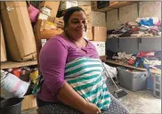  ?? EMILY SCHMALL / AP ?? Piedad de Jesus Mejia sits in a storage room at a migrant shelter in Reynosa, Mexico, in late June. She and her husband and five children fled their Honduras home a day after MS-13 gang members threatened a son.