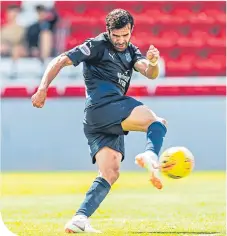  ??  ?? Dundee’s Sofien Moussa opens the scoring for the Dark Blues