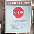  ?? GILLIAN FLACCUS/AP ?? The Vancouver Clinic inWashingt­on state warns patients and visitors to take precaution­s against a measles outbreak in the Pacific Northwest.