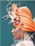  ?? Picture: AFP ?? A model prepares for a photoshoot ahead of the 157th Melbourne Cup