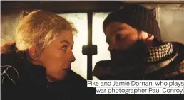  ??  ?? Pike and Jamie Dornan, who plays war photograph­er Paul Conroy.