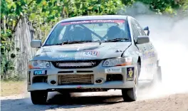  ??  ?? Yasith Gamage and Dhakshina Amarasingh­e roaring through the gravel terrains in the north