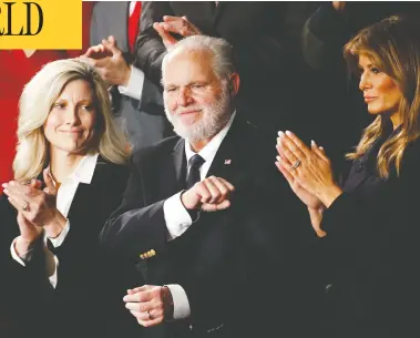  ?? PATRICK SEMANSKY / AP FILE PHOTO ?? Rush Limbaugh, his wife Kathryn, left, and Melania Trump, attend then-president Donald Trump's State of the Union
address in February 2020. Limbaugh, the talk radio host who became the voice of U.S. conservati­sm, has died.