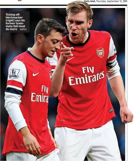  ?? EMPICS ?? Ticking off: Mertesacke­r (right) says his former teammate Ozil must do more