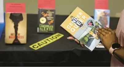  ?? CHRIS SWEDA/CHICAGO TRIBUNE ?? “Gender Queer” by Maia Kobabe is part of a selection of banned and challenged books displayed during Banned Books Week 2022 at the Lincoln Belmont branch of the Chicago Public Library on Sept. 22.