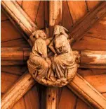  ??  ?? The Bishop’s Eye window, with its upward foliate forms, dominates the south transept (left). Carvings on wooden roof trusses (right).