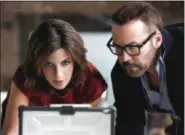  ?? CBS ?? Natalia Tena and Jeremy Piven appear in a scene from the new CBS series “Wisdom of the Crowd.”