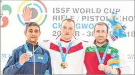  ??  ?? India’s Shahzar Rizvi (L) gold medallist Artem Chernousov of Russia (C) and bronze medallist Samuil Donkov of Bulgaria with their medals after the 10m Air Pistol final. Pic: ISSF