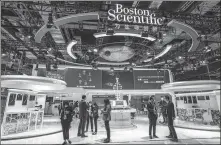  ?? PROVIDED TO CHINA DAILY ?? Visitors check out the Boston Scientific booth at the third China Internatio­nal Import Expo in Shanghai in November.