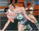  ?? GREGG SLABODA — TRENTONIAN FILE PHOTO ?? Robbinsvil­le’s Ryan Kanner, top, won his match at 126 pounds Friday night against Trenton.