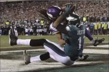  ?? MATT ROURKE — THE ASSOCIATED PRESS ?? The Eagles’ Alshon Jeffery catches a touchdown pass during the NFC championsh­ip game against the Vikings on Jan. 21 in Philadelph­ia.