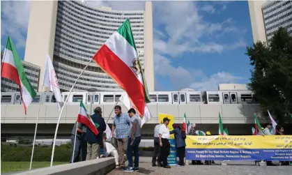  ?? Photograph: Joe Klamar/AFP/Getty Images ?? Iranian opposition members protest outside the IAEA headquarte­rs in Vienna on Monday.