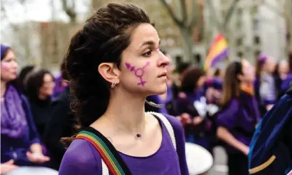  ?? Photograph: Ely Pineiro/Getty Images ?? A woman attending an Internatio­nal Women's Day railly in Madrid in 2020.