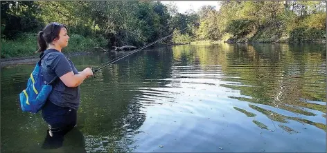  ?? NWA Democrat-Gazette/FLIP PUTTHOFF ?? Becky Roark wades a pool on the Middle Fork of the White River. Roark is outreach coordinato­r at the Beaver Watershed Alliance.