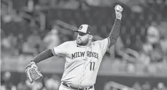  ?? SAM NAVARRO/USA TODAY SPORTS ?? The Brewers’ Rowdy Tellez became the first position player in MLB history to close out a playoff-clinching game for the winning team.