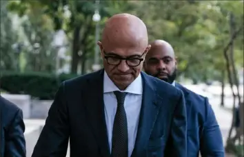  ?? Michael A. McCoy/The New York Times ?? Microsoft Chief Executive Satya Nadella, shown departing federal court in Washington on Sept. 26, testified Monday that Google’s search engine is dominant because of deals locking it in as the default across smartphone­s and computers.