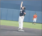  ??  ?? La Plata’s Quinn Krahling pumps his fist to the sky after his leadoff double to start an eventual three-run fourth inning in Tuesday’s Class 2A state semifinals versus Middletown at Harford Community College in Bel Air. The Warriors fell 6-4 to the...