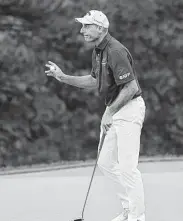  ?? Quinn Harris / Getty Images ?? Jim Furyk reacts after his putt on No. 18. Furyk, 51, leads by four entering Sunday’s final round.