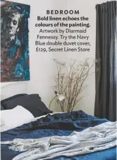  ??  ?? BEDROOM Bold linen echoes the colours of the painting. Artwork by Diarmaid Fennessy. Try the Navy Blue double duvet cover, £129, Secret Linen Store