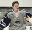  ??  ?? Harrison Browne high-fives fans prior to a Buffalo Beauts game.