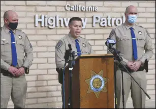  ?? ASSOCIATED PRESS ?? California Highway Patrol Captain Kevin Clays (center) updates the media Saturday about Friday’s fatal crash on Highway 33 on Saturday in Coalinga. Investigat­ors are asking for the public’s help to determine what led up to a head-on crash that killed seven children and two adults.