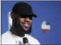  ?? CARLOS OSORIO — THE ASSOCIATED PRESS ?? Cleveland Cavaliers forward LeBron James smiles during a news conference following Game 4 of basketball’s NBA Finals against the Golden State Warriors, early Saturday in Cleveland. The Warriors defeated the Cavaliers 108-85 to sweep the series and take...