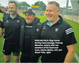  ??  ?? HURLING PALS: Sligo Senior hurling team manager Padraig Mannion, centre, with two members of his backroom team, Declan Molloy, left, and Donal Tully, right.