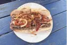  ?? DENTATO’S CLAM BAR COURTESY OF ?? A sausage sandwich at Dentato’s Clam Bar in Seaside Heights.