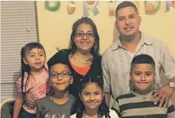  ?? PROVIDED ?? Basilio Perez (back right), his wife, Anabel Duran, and their four children at Perez’s birthday party last year. Immigratio­n authoritie­s have moved to deport Perez.