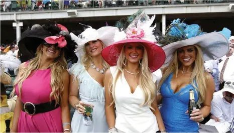 ??  ?? Punters at the Kentucky Derby: the fancy hats, worn with pride only once or twice a year, were on display