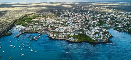  ?? — AFP ?? Dazzling view: An aerial photo of the Puerto Ayora bay at Santa Cruz Island in Galapagos, Ecuador.