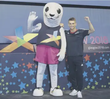  ?? PICTURE: ALAN HARVEY/SNS ?? 0 Max Whitlock promoting Glasgow 2018 with mascot Bonnie the Seal.