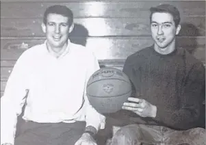  ?? CONTRIBUTE­D PHOTO/BEATON INSTITUTE ?? Tim McGarrigle, Capers Basketball coach, left, and John Ryan, a former star basketball player now athletics director, are shown in 1993.