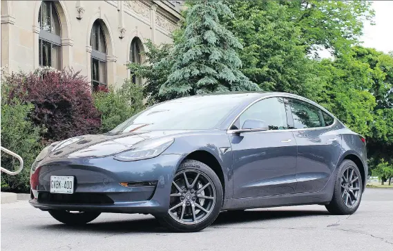  ?? PHOTOS: PETER BLEAKNEY/DRIVING ?? The long-awaited Tesla Model 3 offers sharp handling and with the long-range battery is expected to travel almost 500 kilometres on a charge.