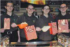  ??  ?? In the line of duty, Police Scotland Youth Volunteers help take over the cinema so its staff get a night off.