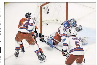  ?? Anthony J. Causi ?? MOST OVER: Ottawa’s Kyle Turris scores the game-winning goal in overtime past Rangers goaltender Henrik Lundqvist to give the Senators a 5-4 victory in Game 5 against the Blueshirts.