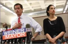  ?? MICHAEL APPLETON, THE NEW YORK TIMES ?? Huma Abedin, right, shown here with husband and former congressma­n Anthony Weiner in a file photo, announced Monday they’re separating.