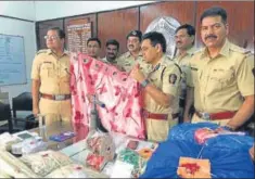  ?? HT ?? The team displays one of the curtains used by the accused (right) to smuggle cocaine.