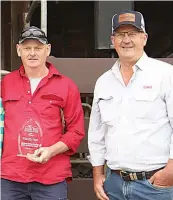  ?? ?? John Archibald of Wonyip Park, winner of the highest eating quality award, with Steve Rennie of Coles.