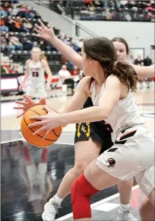  ?? TIMES photograph­s by Annette Beard ?? Senior Lady Blackhawk Aidan Dayberry, No. 5, worked around a defender Friday, Jan. 8, in the contest against the Lady Tigers from Prairie Grove. For more photograph­s, go tohttps://tnebc.nwaonline. com/photos/.